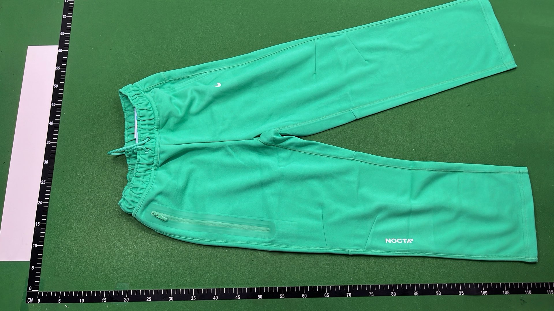 Nike Sportswear Pants in Green, Black, and White