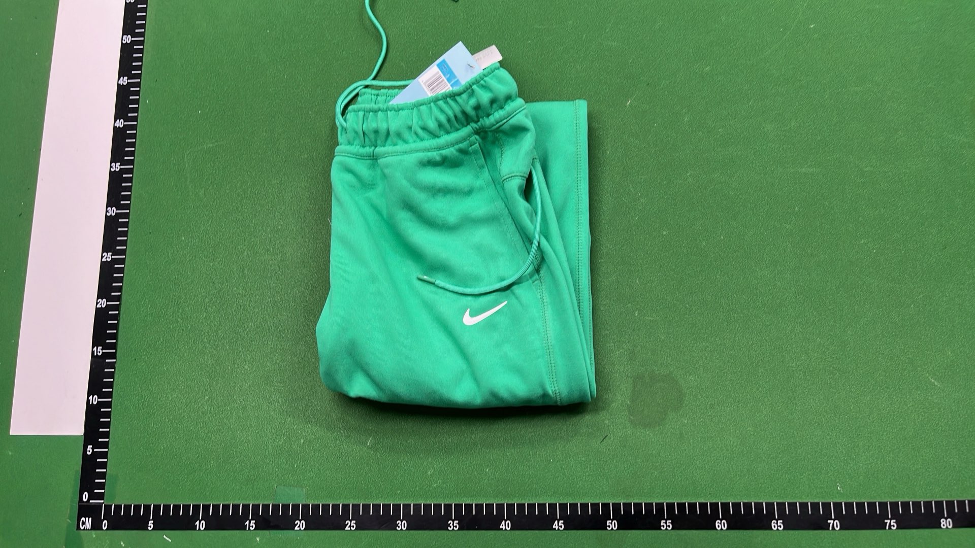 Nike Sportswear Pants in Green, Black, and White