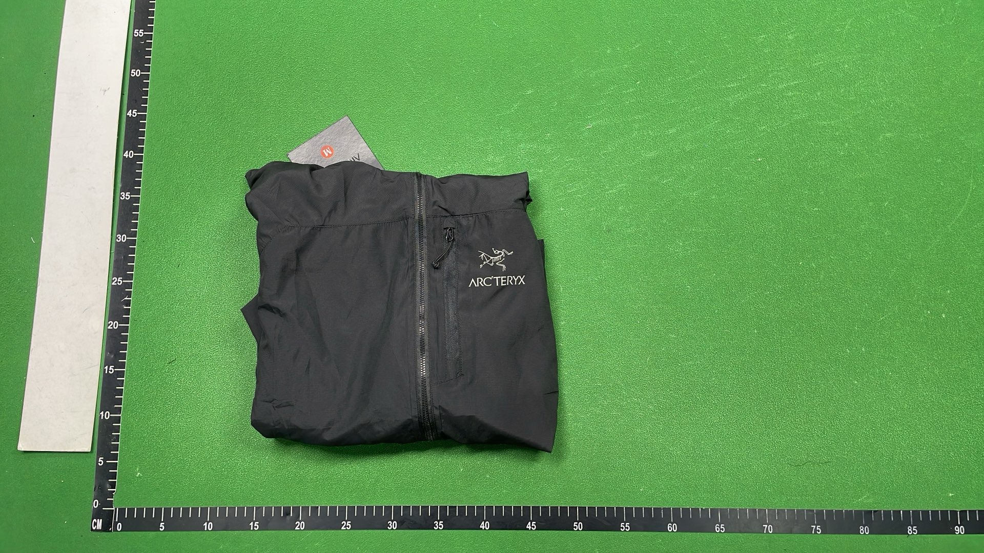 Arc'teryx Black Hooded Jacket for Outdoor Activities