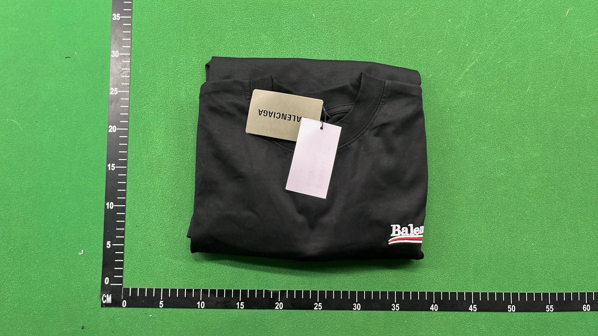 Balenciaga Black Oversized T-Shirt with Checkered Sleeve Detail