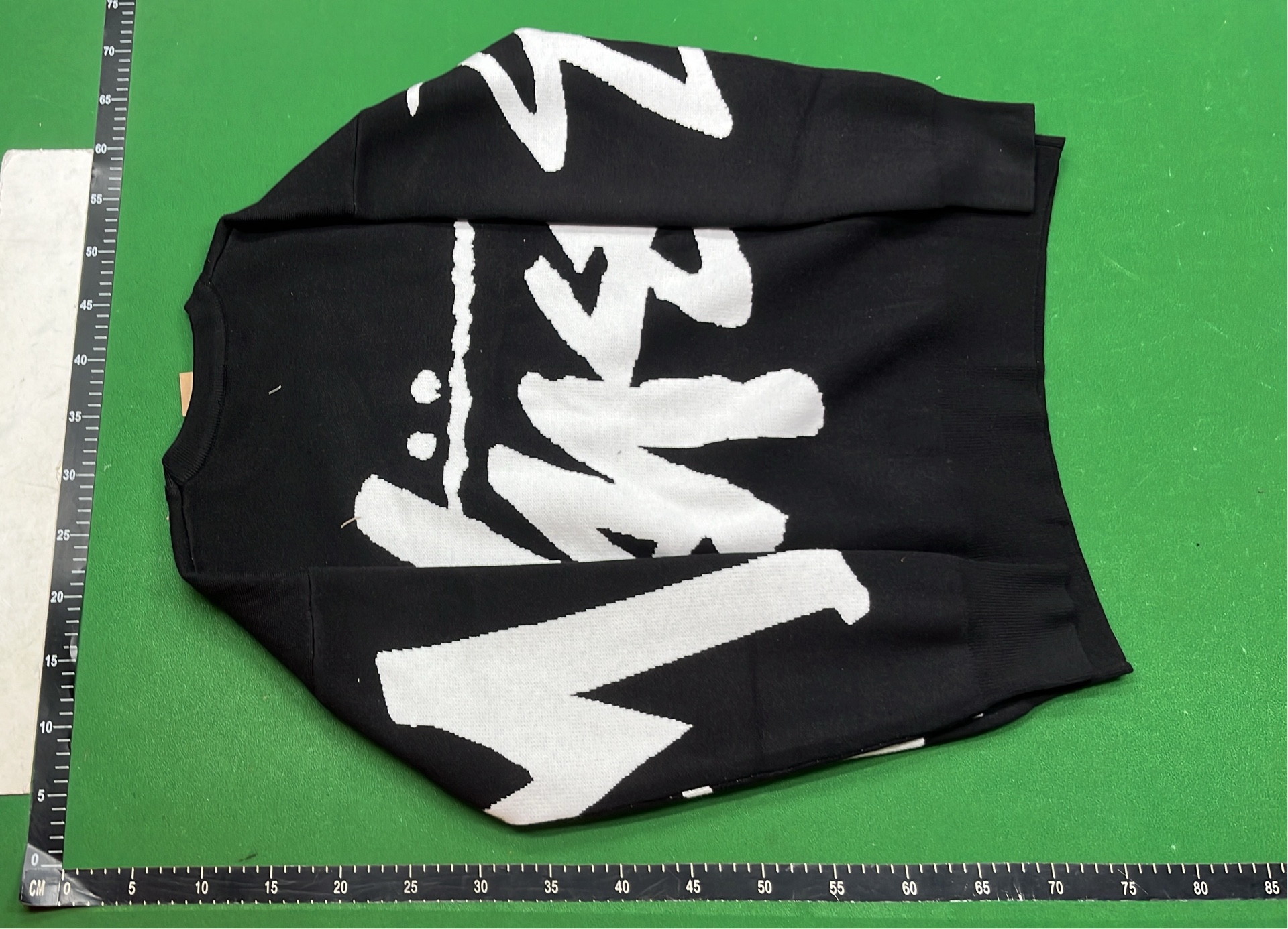 Stussy Pink Knit Sweater with Black Logo Design