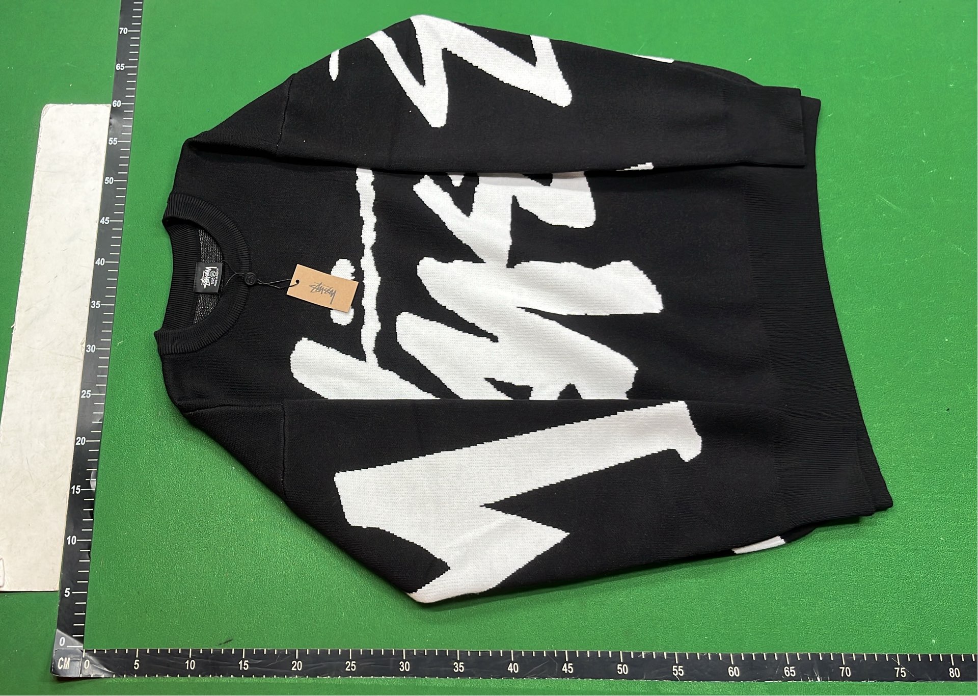Stussy Pink Knit Sweater with Black Logo Design
