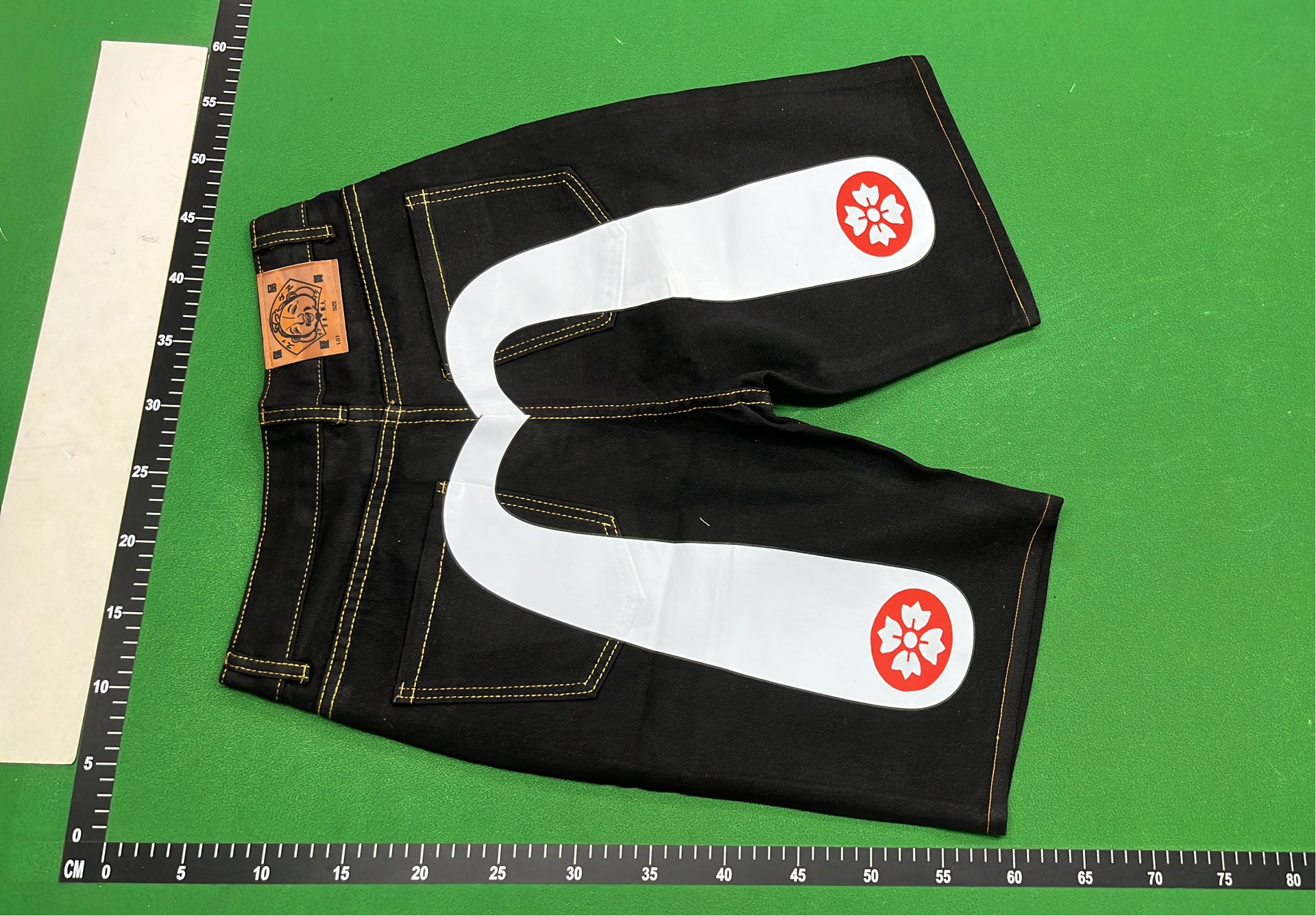 Evisu Denim Pants with Unique Back Patch Designs