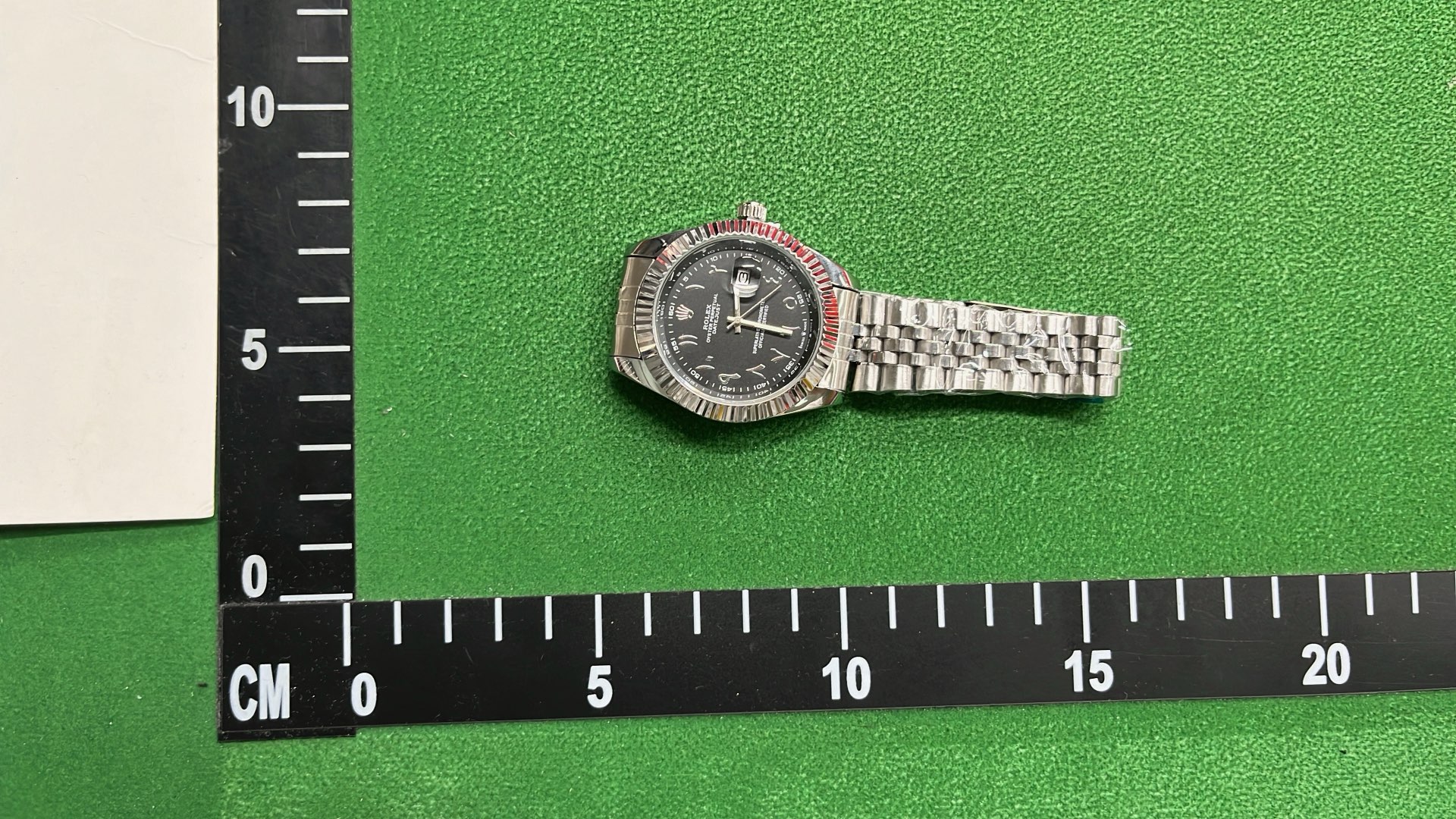 Stainless Steel Rolex Watch with Black Dial and Date Display