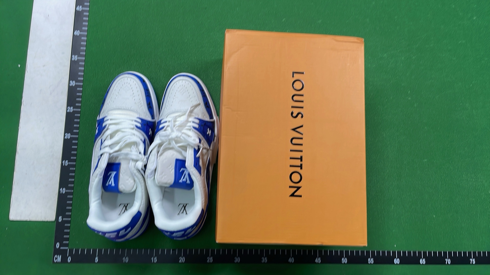 Louis Vuitton White and Black Sneakers with LV Logo