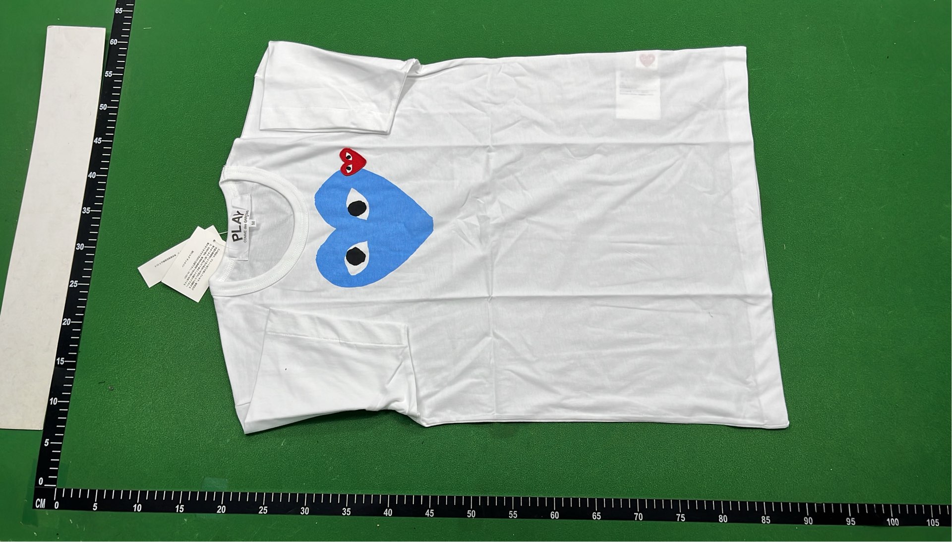 White T-Shirt with Pink Heart and Eyes Graphic