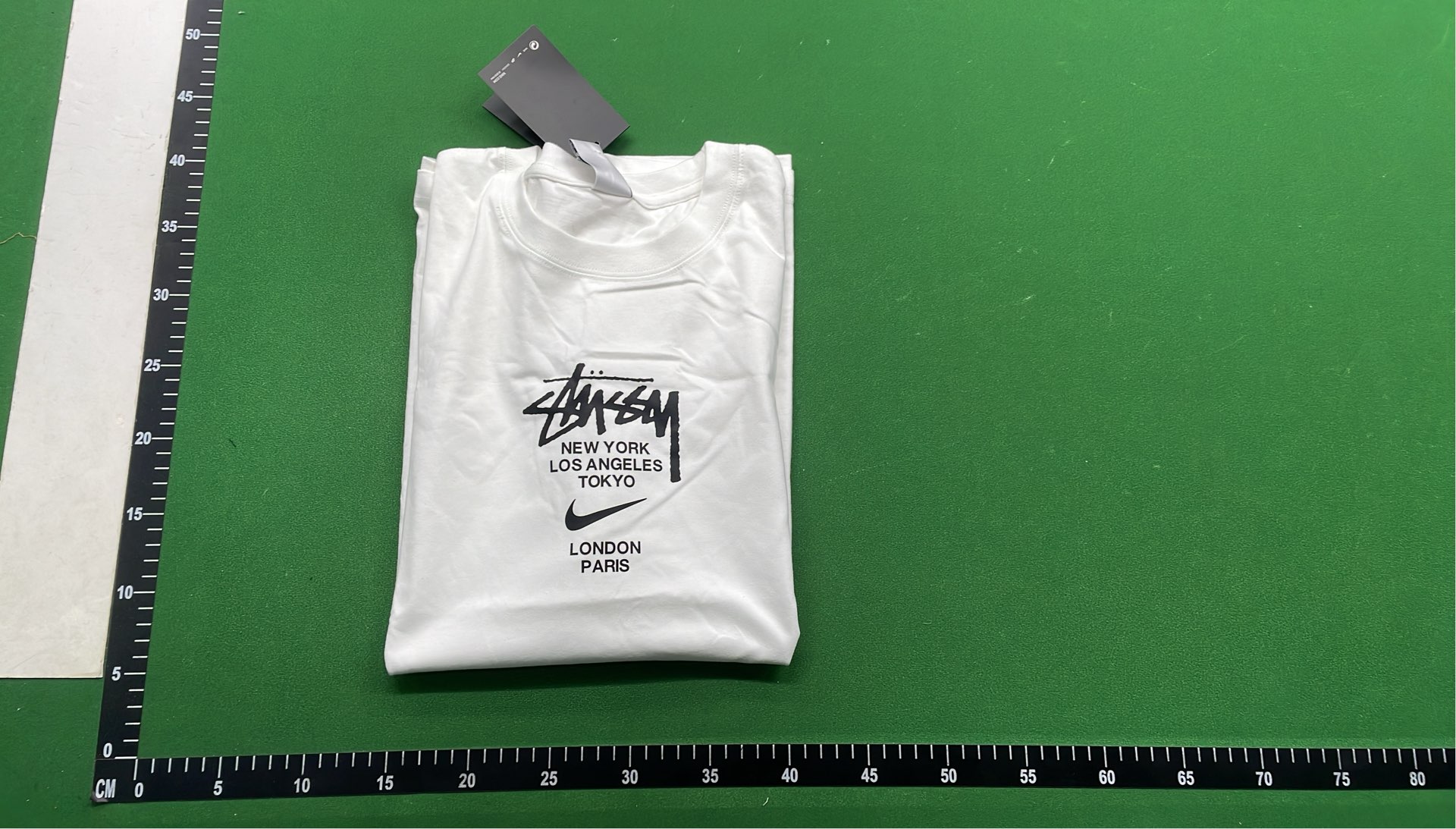 Stussy Green T-Shirt with White Logo Print