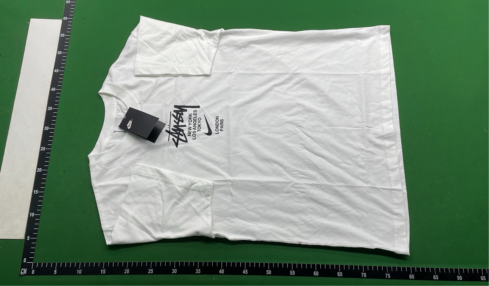 Stussy Green T-Shirt with White Logo Print