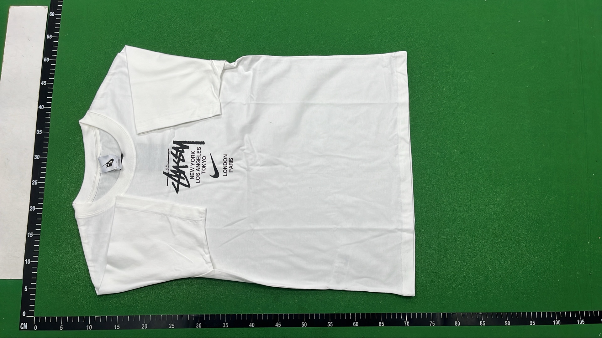 Stussy Green T-Shirt with White Logo Print
