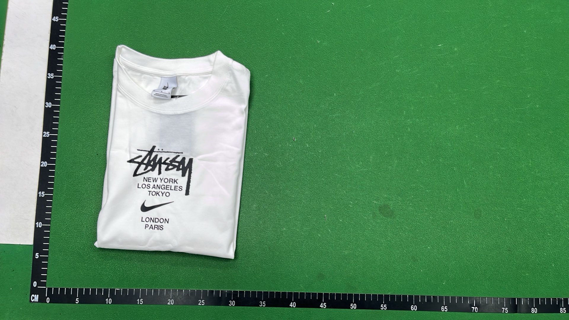 Stussy Green T-Shirt with White Logo Print