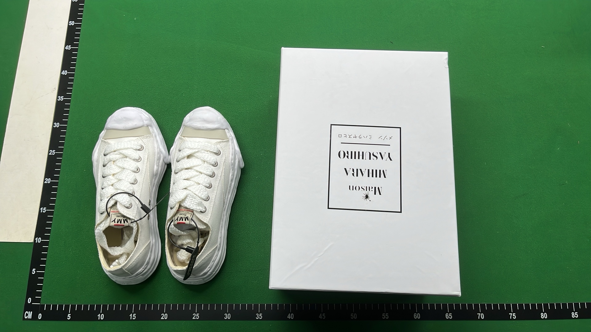 MMY Black and White Distressed Sneakers