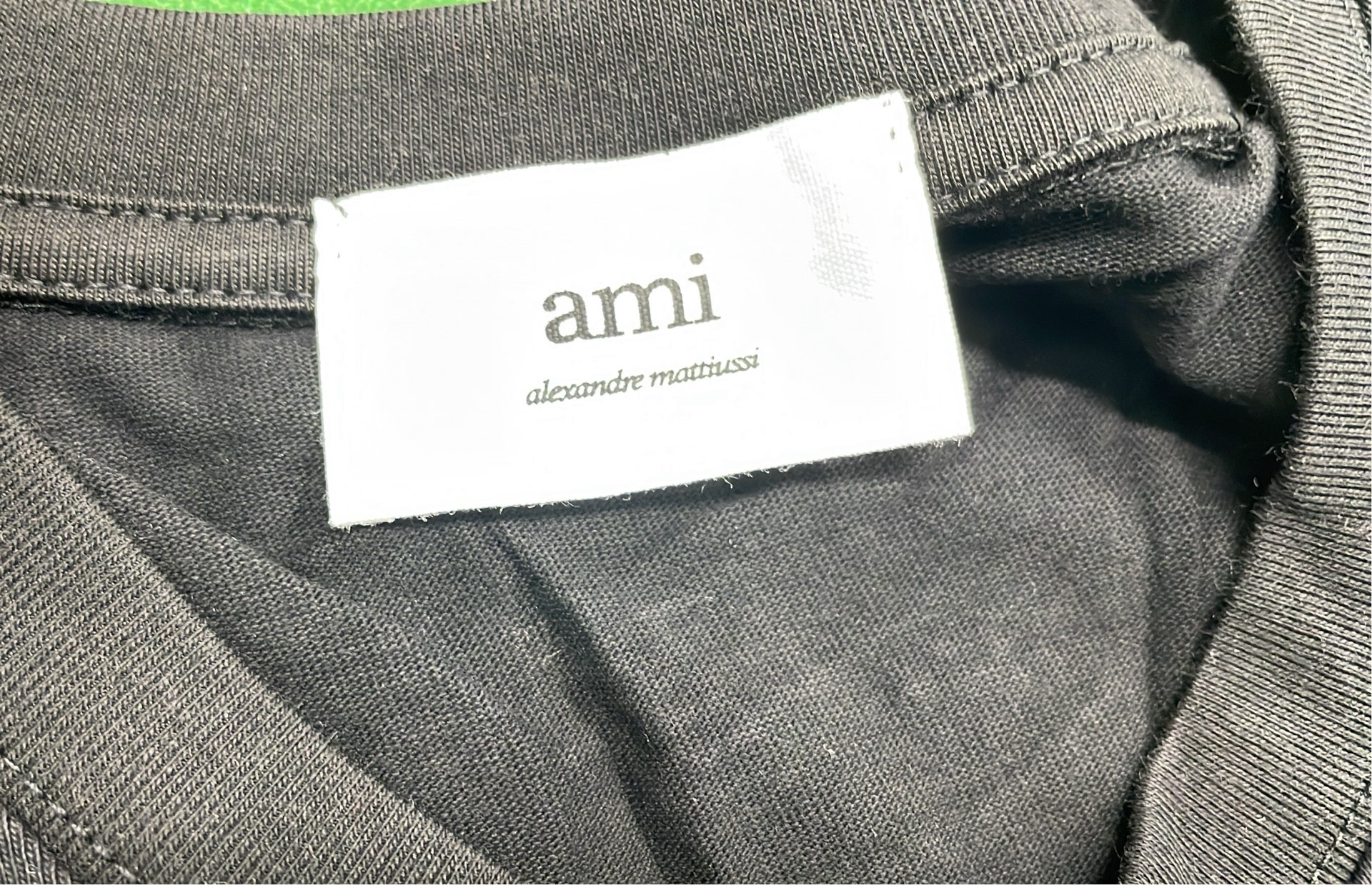 Minimalist T-Shirt with Small Red Logo