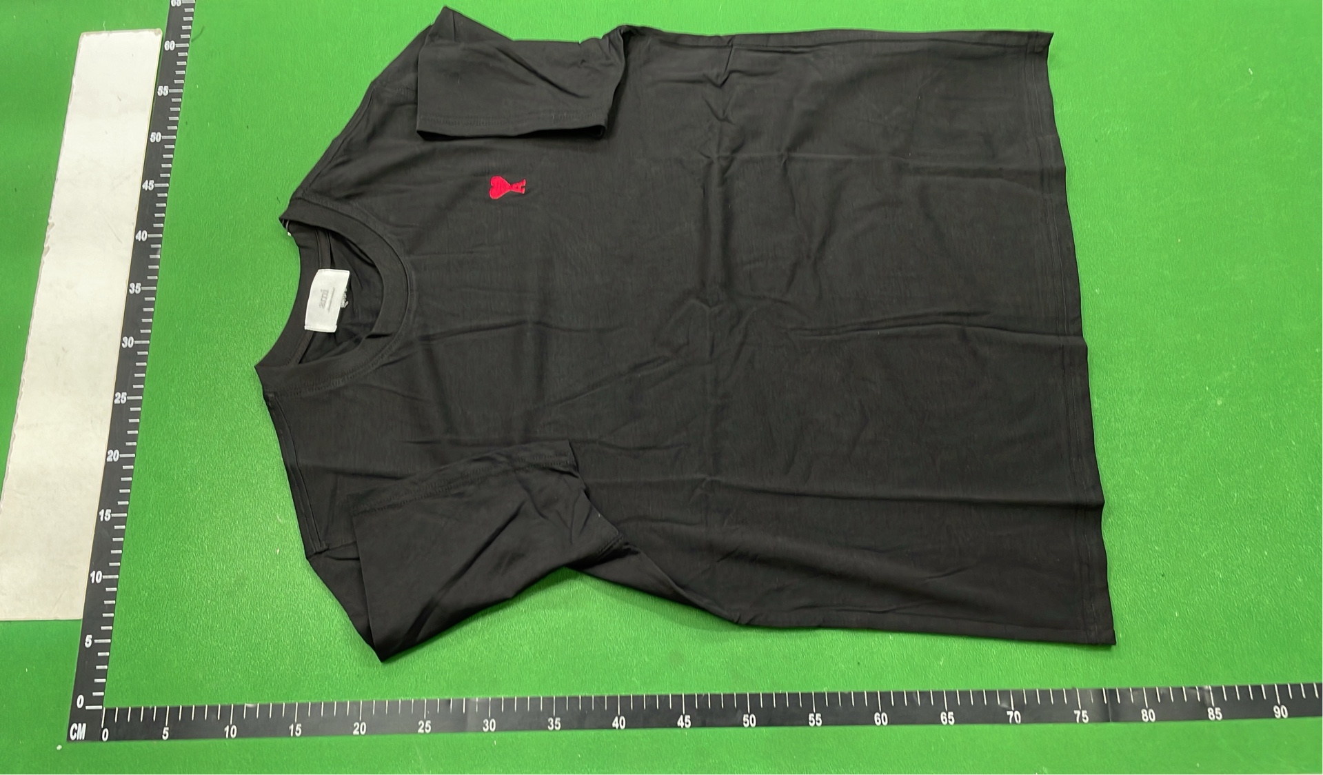 Minimalist T-Shirt with Small Red Logo