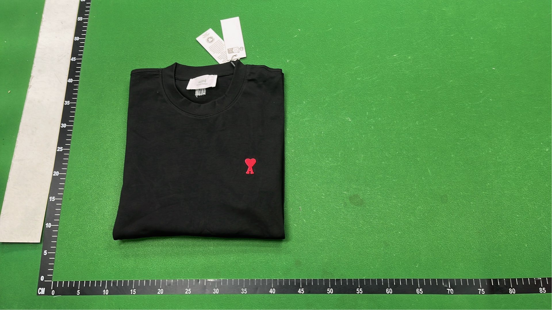 Minimalist T-Shirt with Small Red Logo