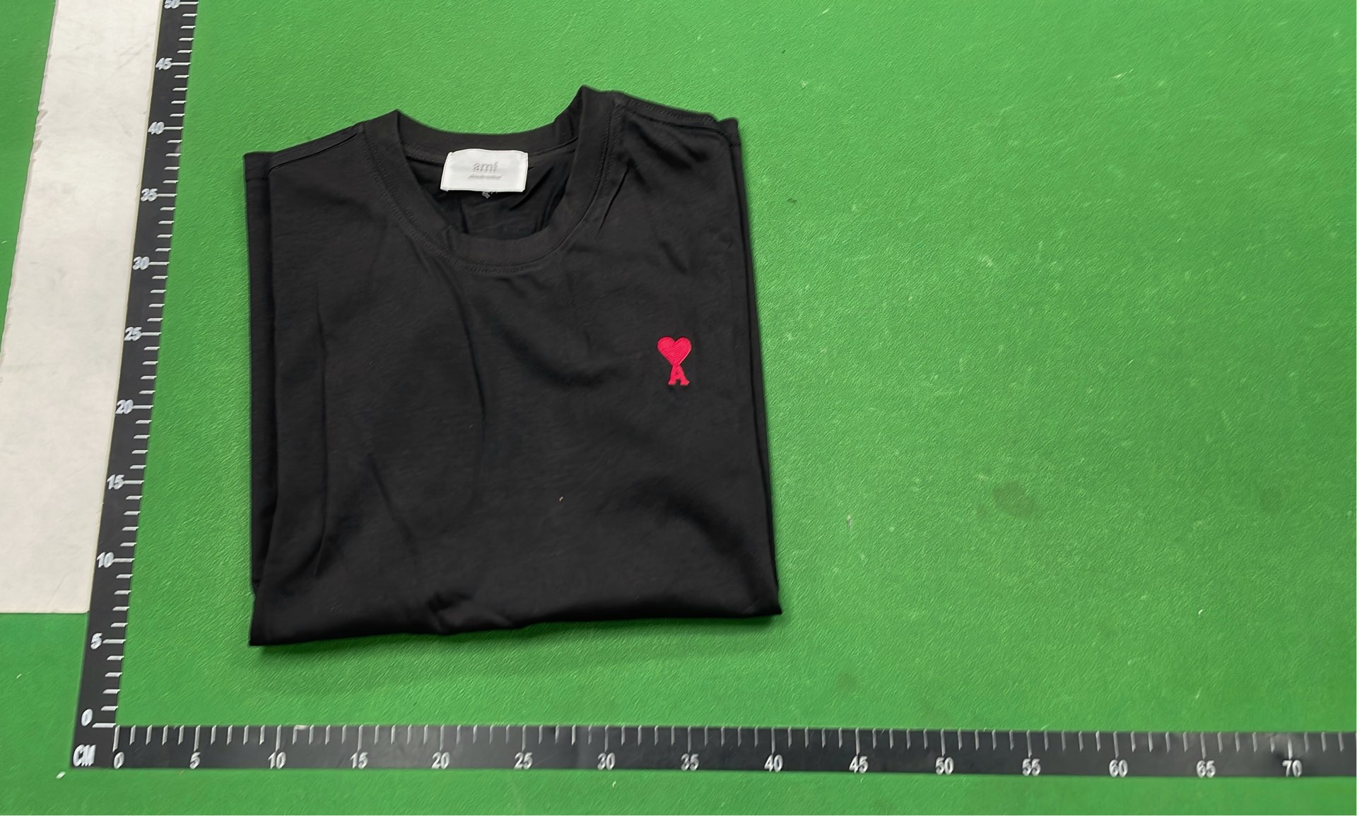 Minimalist T-Shirt with Small Red Logo