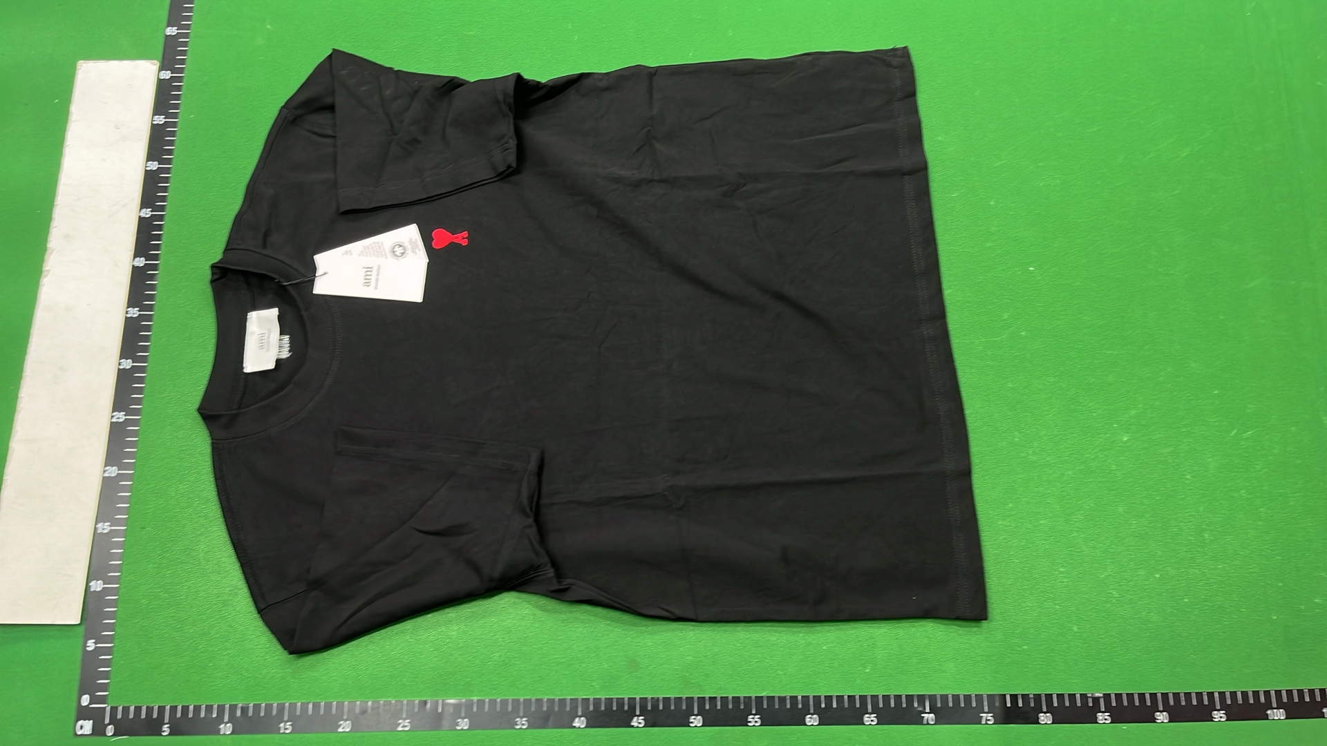 Minimalist T-Shirt with Small Red Logo