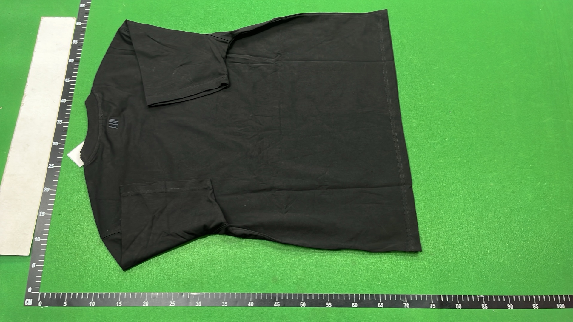 Minimalist T-Shirt with Small Red Logo