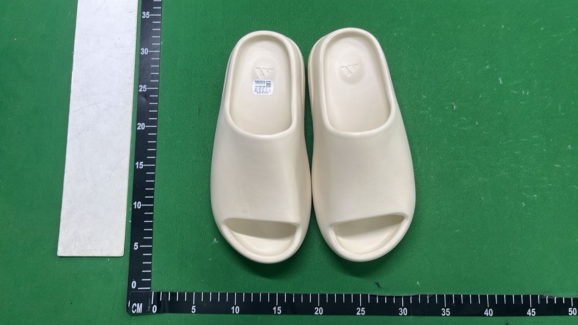 Adidas Yeezy Slide Sandals in Beige and Brown
