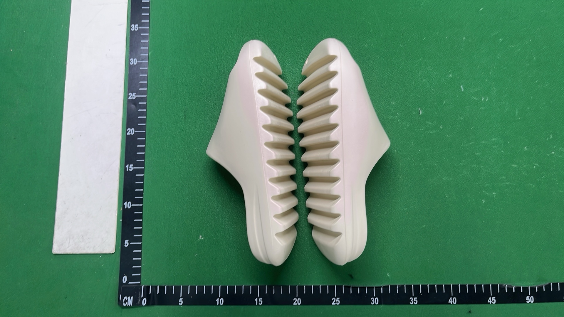 Adidas Yeezy Slide Sandals in Beige and Brown