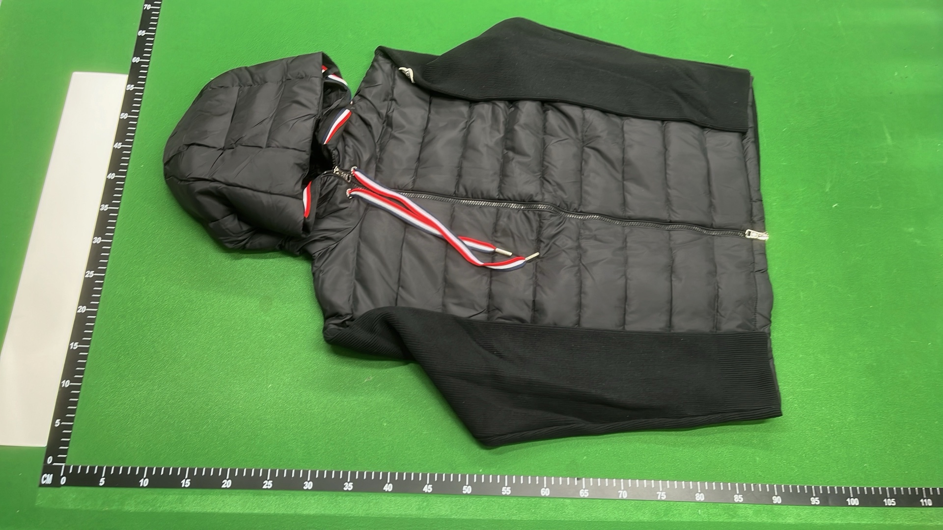 Moncler Black Puffer Jacket with Ribbed Sleeves and High Collar