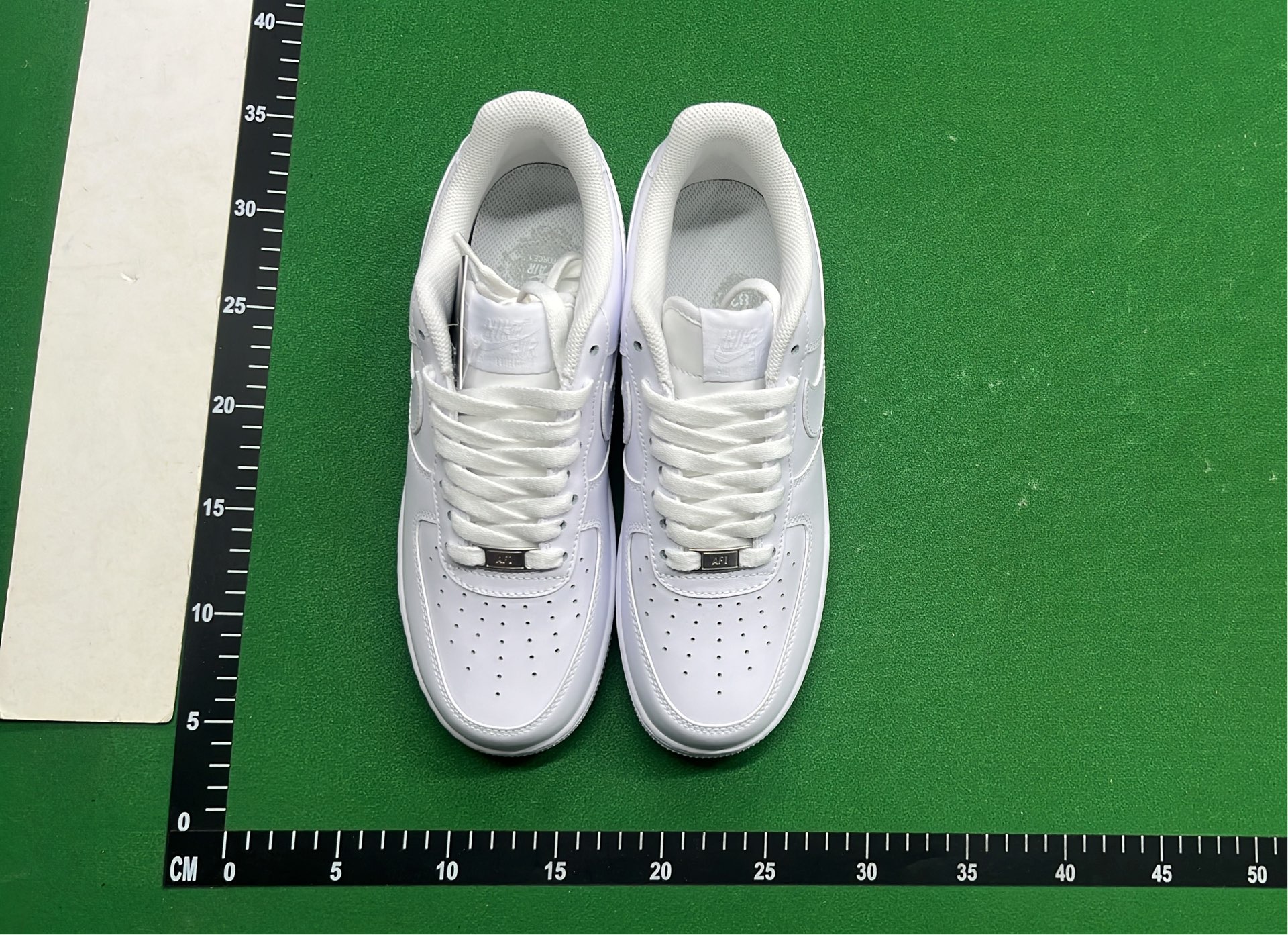 White Nike Air Force 1 Low Sneakers for Men and Women