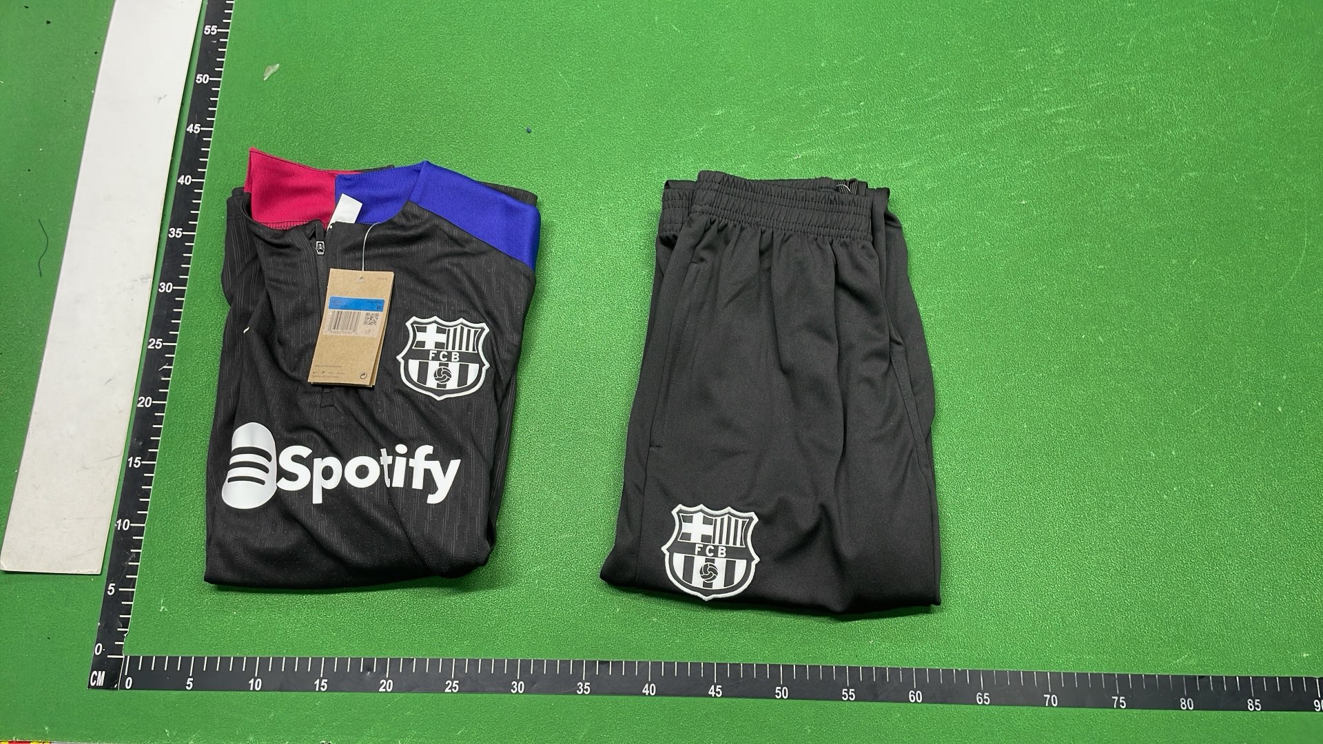 Real Madrid Black Training Kit with Gold Accents