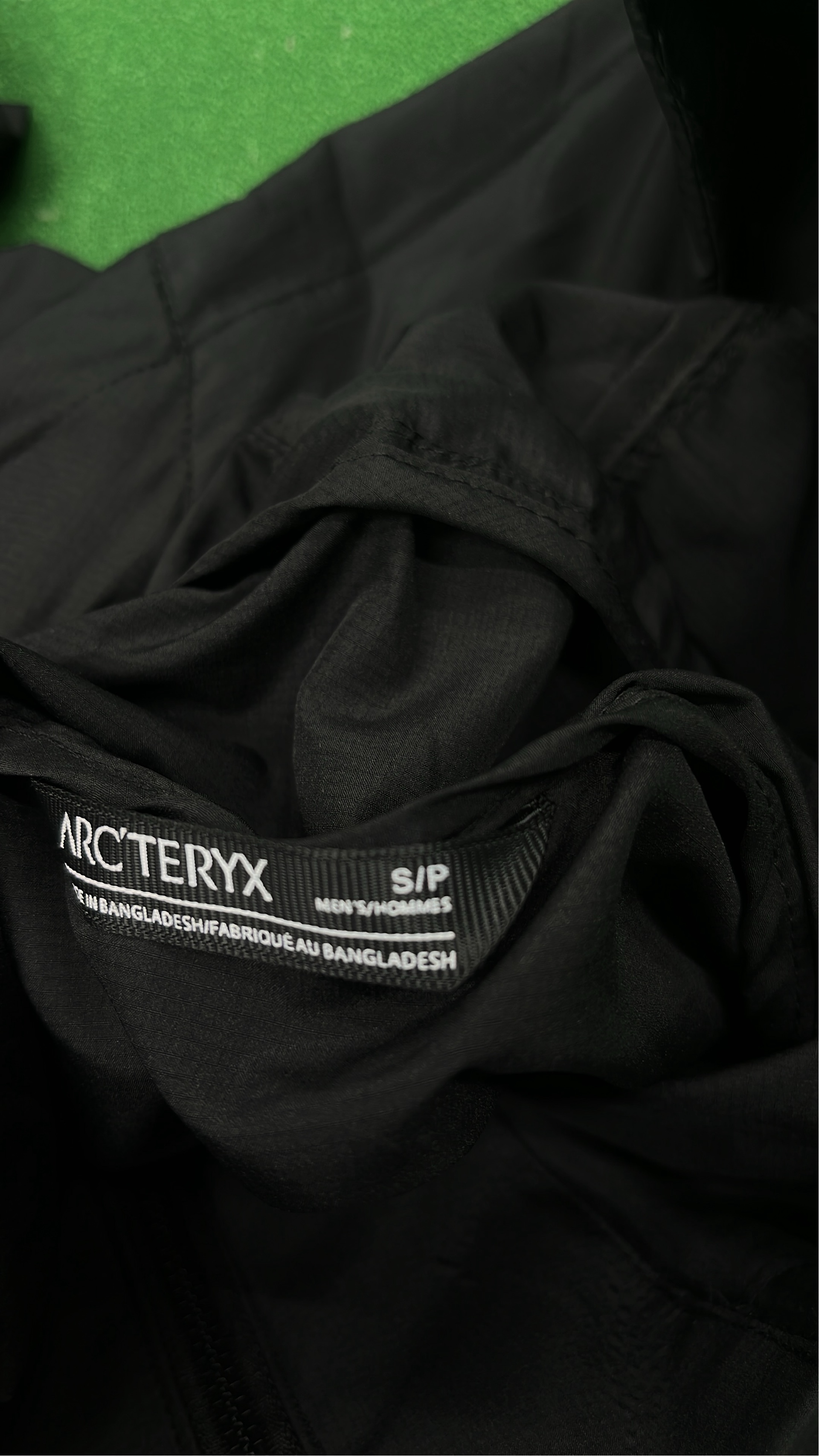 Arc'teryx Black Hooded Jacket for Outdoor Activities