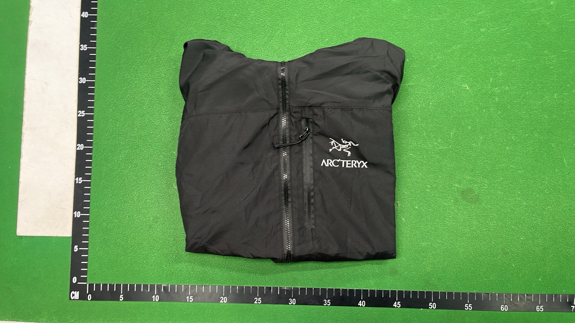 Arc'teryx Black Hooded Jacket for Outdoor Activities