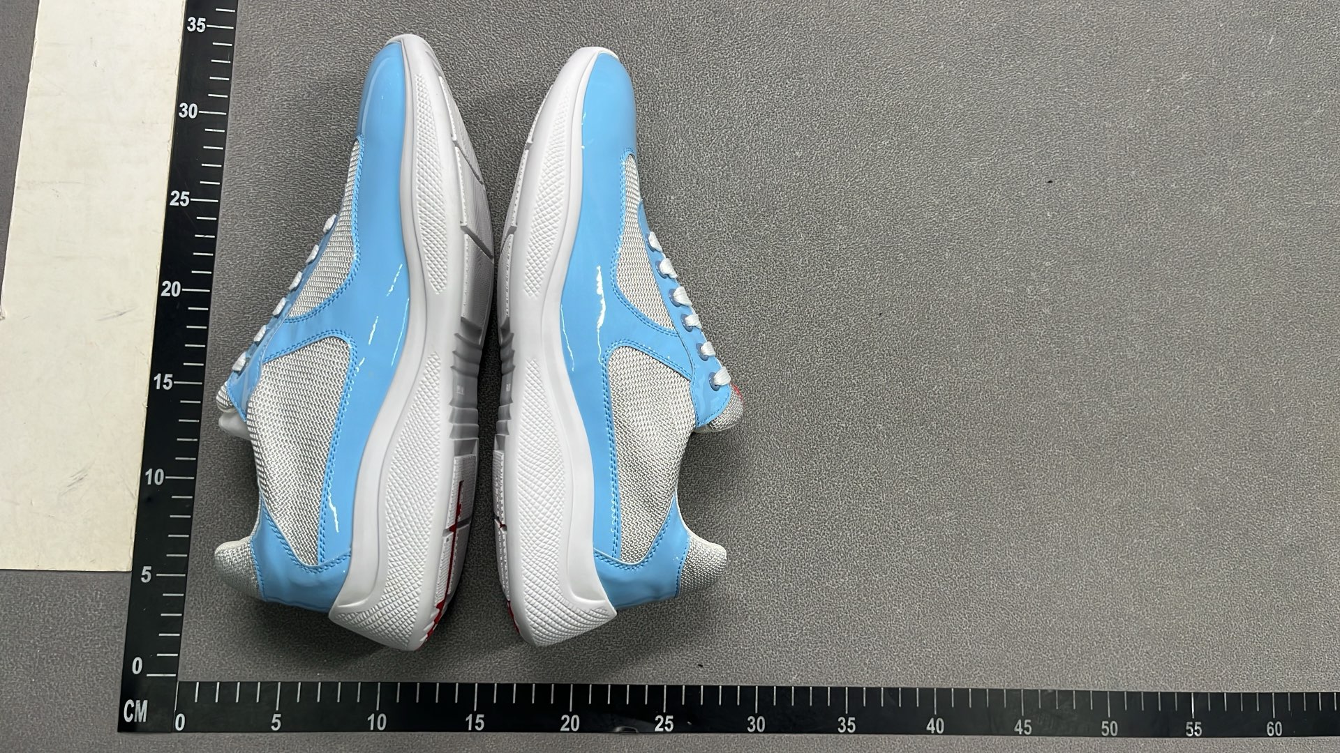 Men's Blue and White Sneakers with Mesh and Patent Leather Design