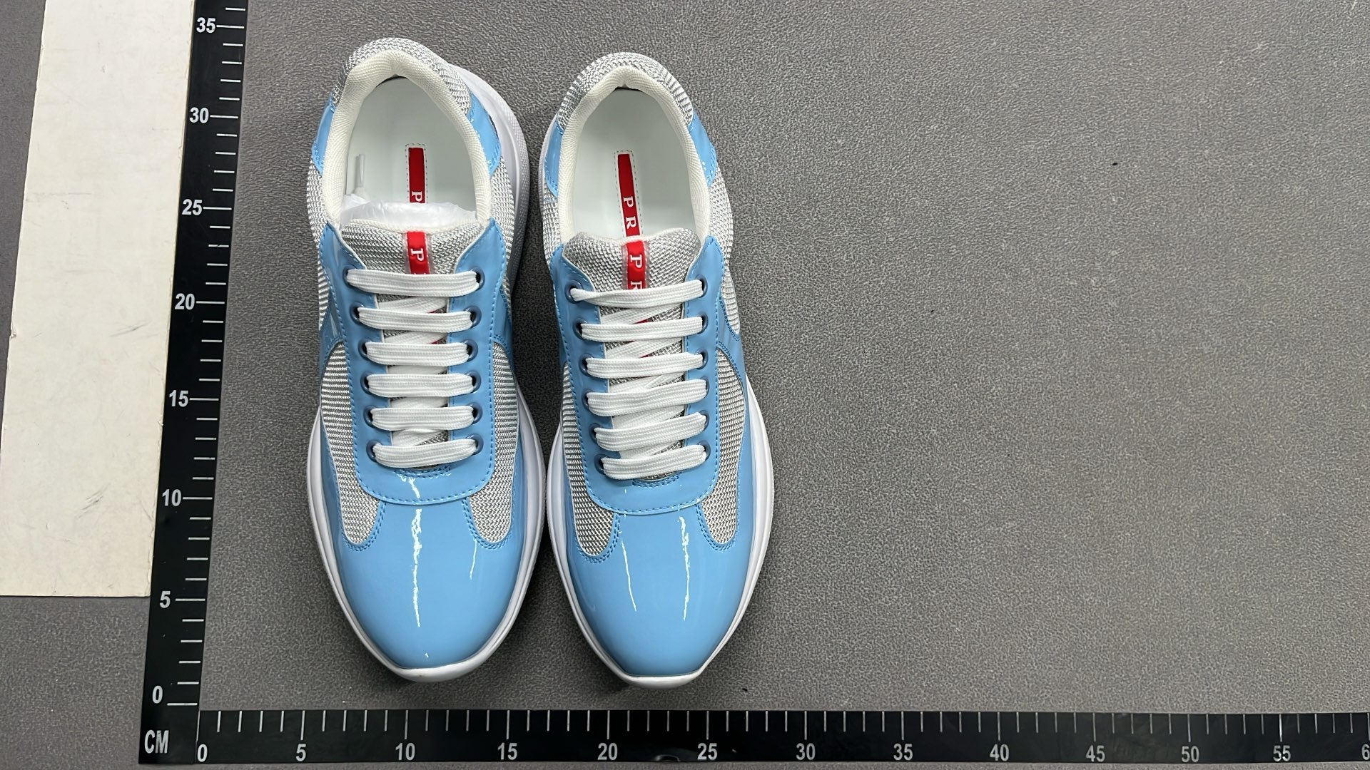 Men's Blue and White Sneakers with Mesh and Patent Leather Design