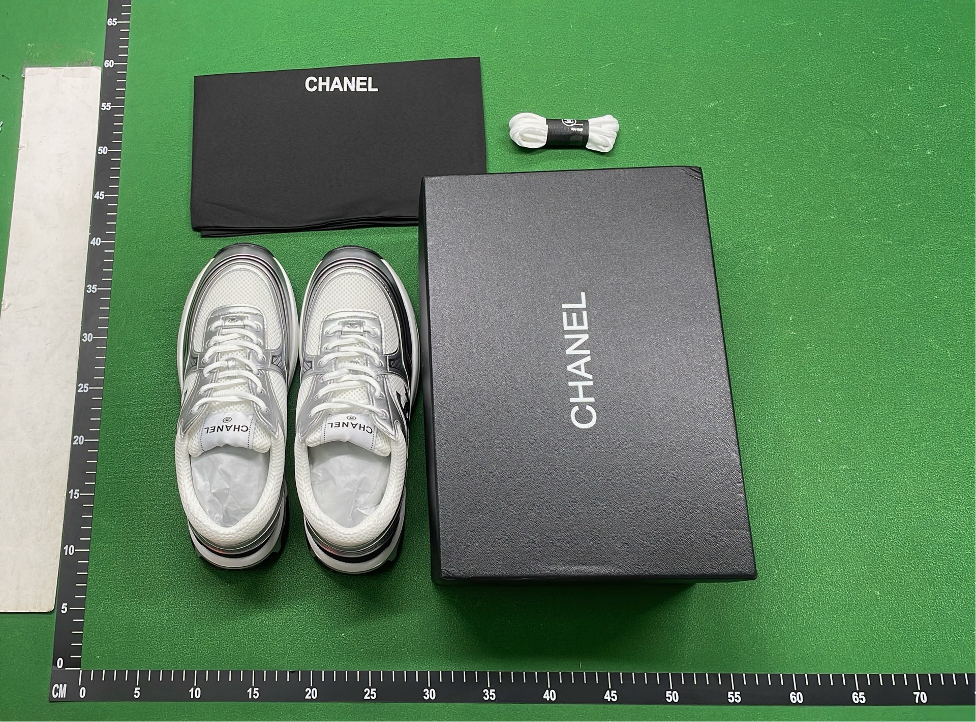 Chanel Silver Sneakers with CC Logo - Luxury Fashion Shoes