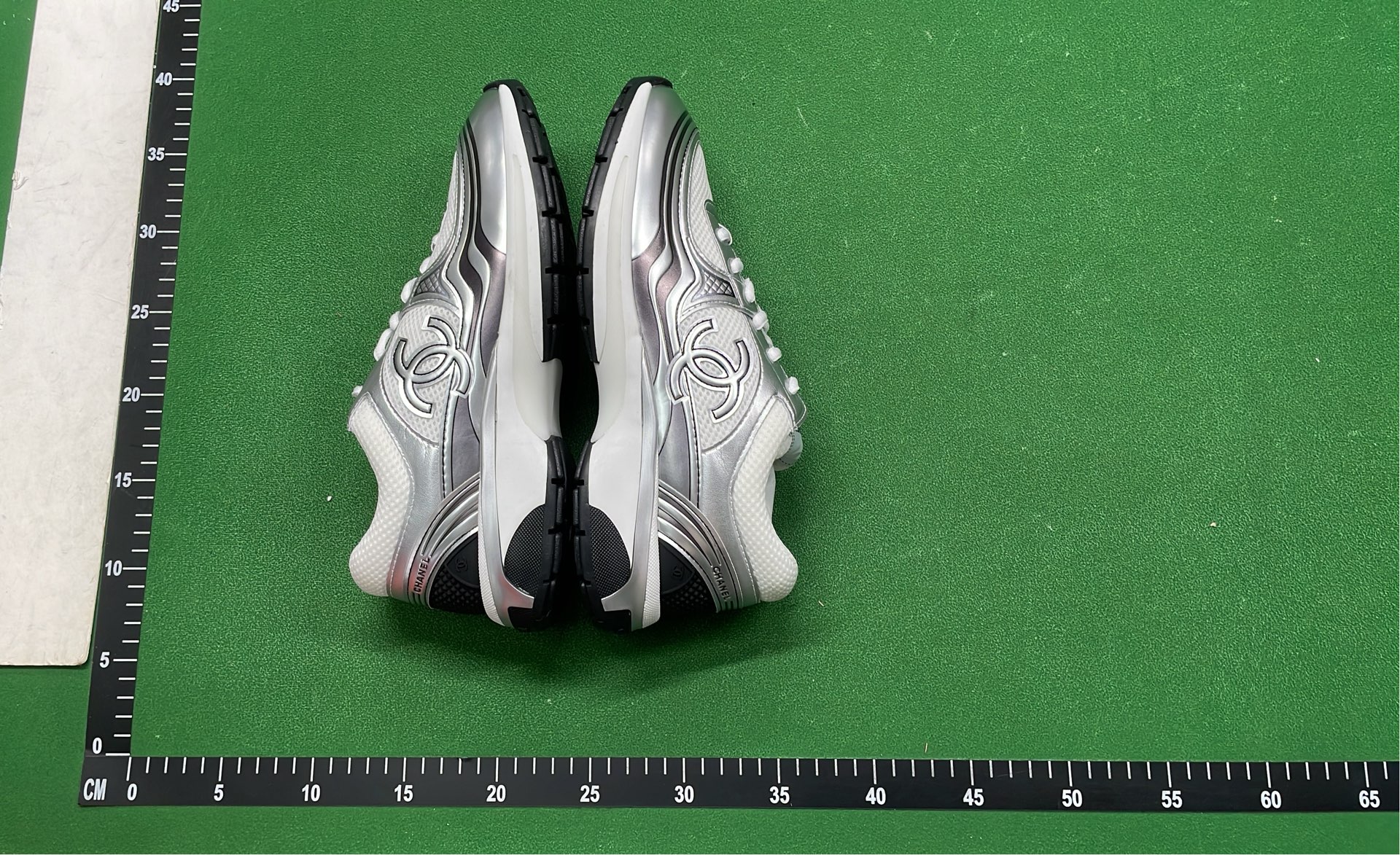 Chanel Silver Sneakers with CC Logo - Luxury Fashion Shoes