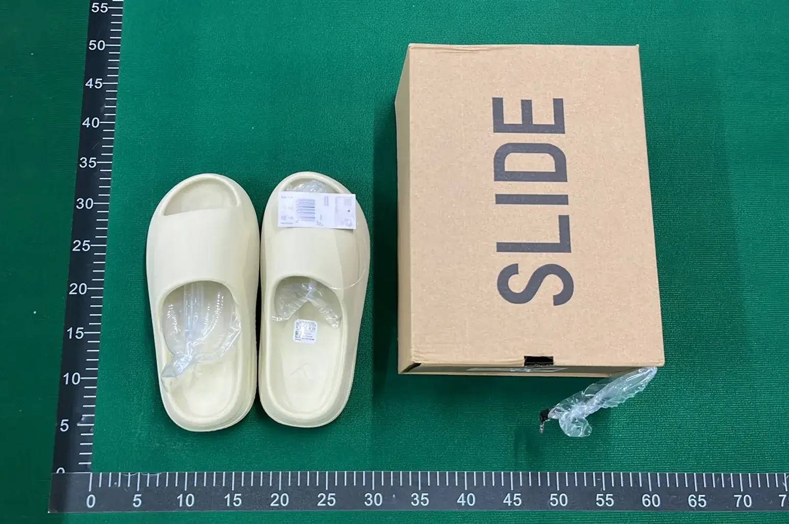 Adidas Originals Yeezy Slide (10+)  in the Best OopBuy Spreadsheet QC photos