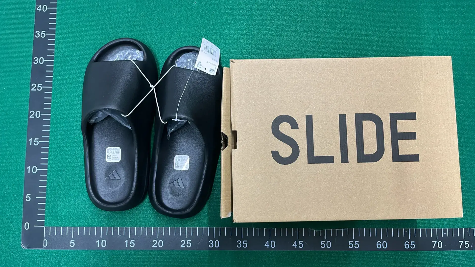 Adidas Originals Yeezy Slide (10+)  in the Best OopBuy Spreadsheet QC photos